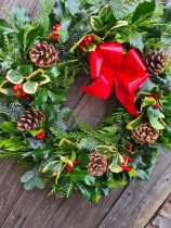 Traditional Holly wreath with cones